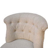 Luxurious hand-carved accent chair in cream with handwoven cotton upholstery and deep button tufts