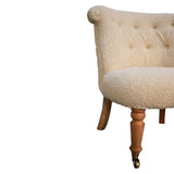 Stylish cream accent chair with handwoven cotton upholstery and solid mango wood frame