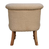 Elegant cream accent chair featuring handwoven cotton upholstery, solid mango wood frame, and caster legs