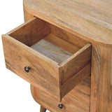 Three roomy drawers of the Mini Oak-ish Cabinet, providing ample storage space for your belongings