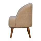 Stylish cream tub chair with hand-carved mango wood frame and handwoven cotton upholstery