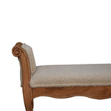 Detailed shot of the sheltering arms and comfortable padding on the Boucle Cream French Style Bench
