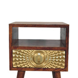The drawer with a beautiful gold brass sheet carved pattern is prominently displayed, adding a touch of sophistication to this eye-catching piece of furniture