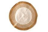 Versatile round rug with earthy tones, ideal for adding visual interest to any room decor
